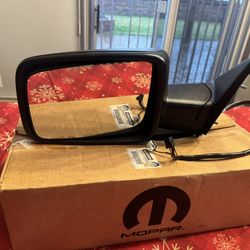 Genuine Mopar  Dodge Ram Side View Mirror. Model # (contact info removed)9AD. Driver Side