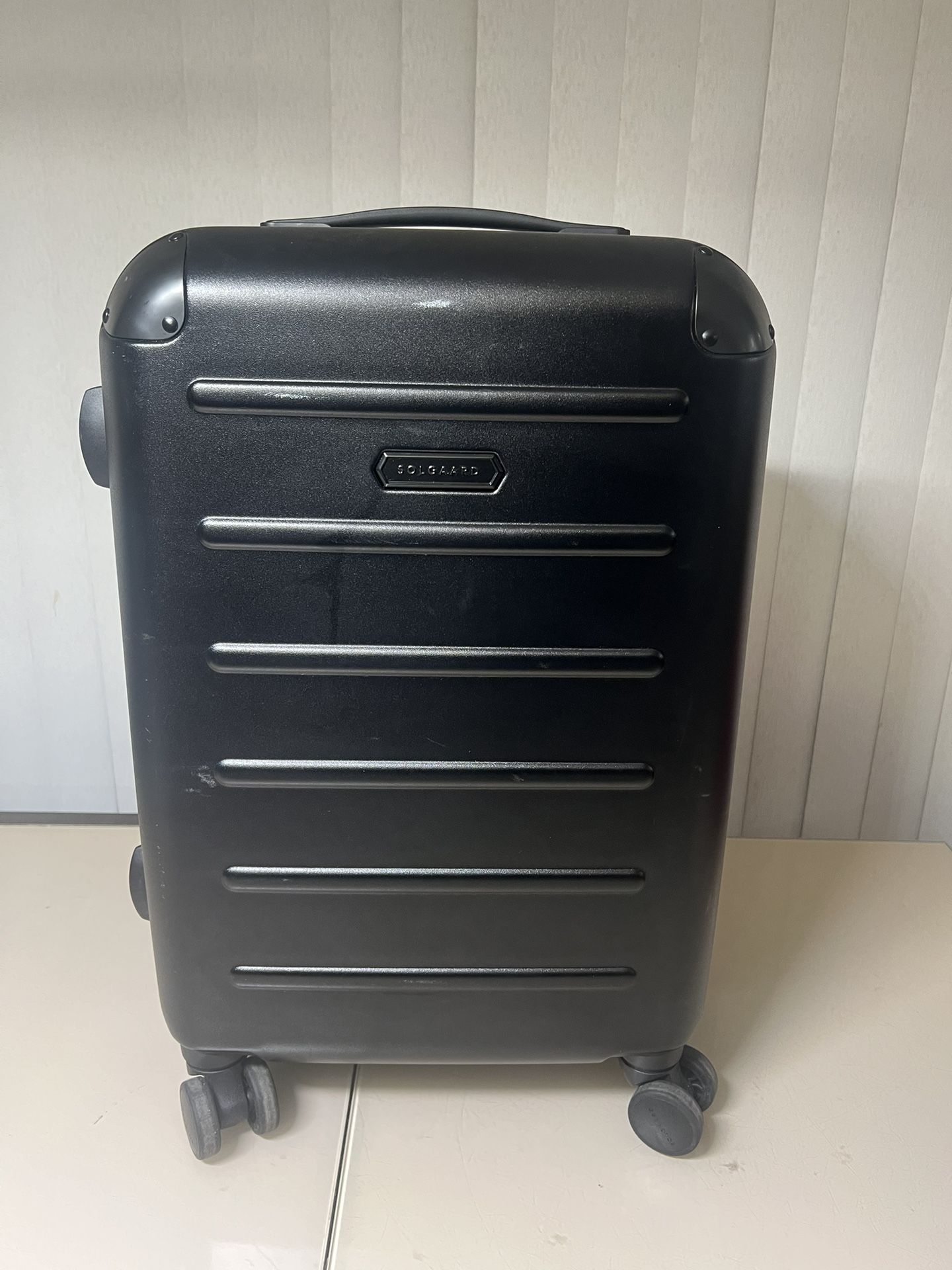 Solgaard Carry-On Closet Suitcase - Medium 20" Balearic Black Great Condition. Pre owned in good condition with some cosmetic blemishes such as minor 