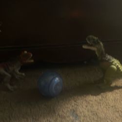 Two Dinosaurs And A Jurassic vehicle