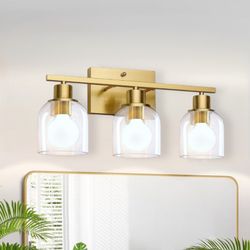 Bathroom Vanity Light Fixtures: 25 Inch Modern Brushed Gold Bathroom Light Fixtures Over Mirror with Clear Glass Shade, 3-Light 