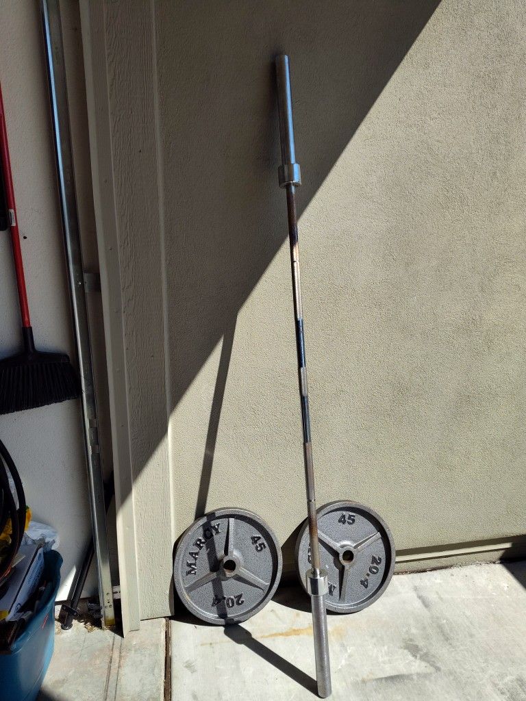 Pair Of 45 Lb Olympic Weights (Marcy) And 7 Ft Olympic Barbell