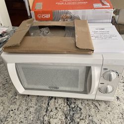 Microwave, 0.6 Cubic Feet White, NEW.