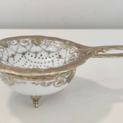ANTIQUE TEA STRAINER/BOWL