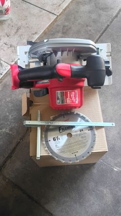 Milwaukee circular saw with blade.