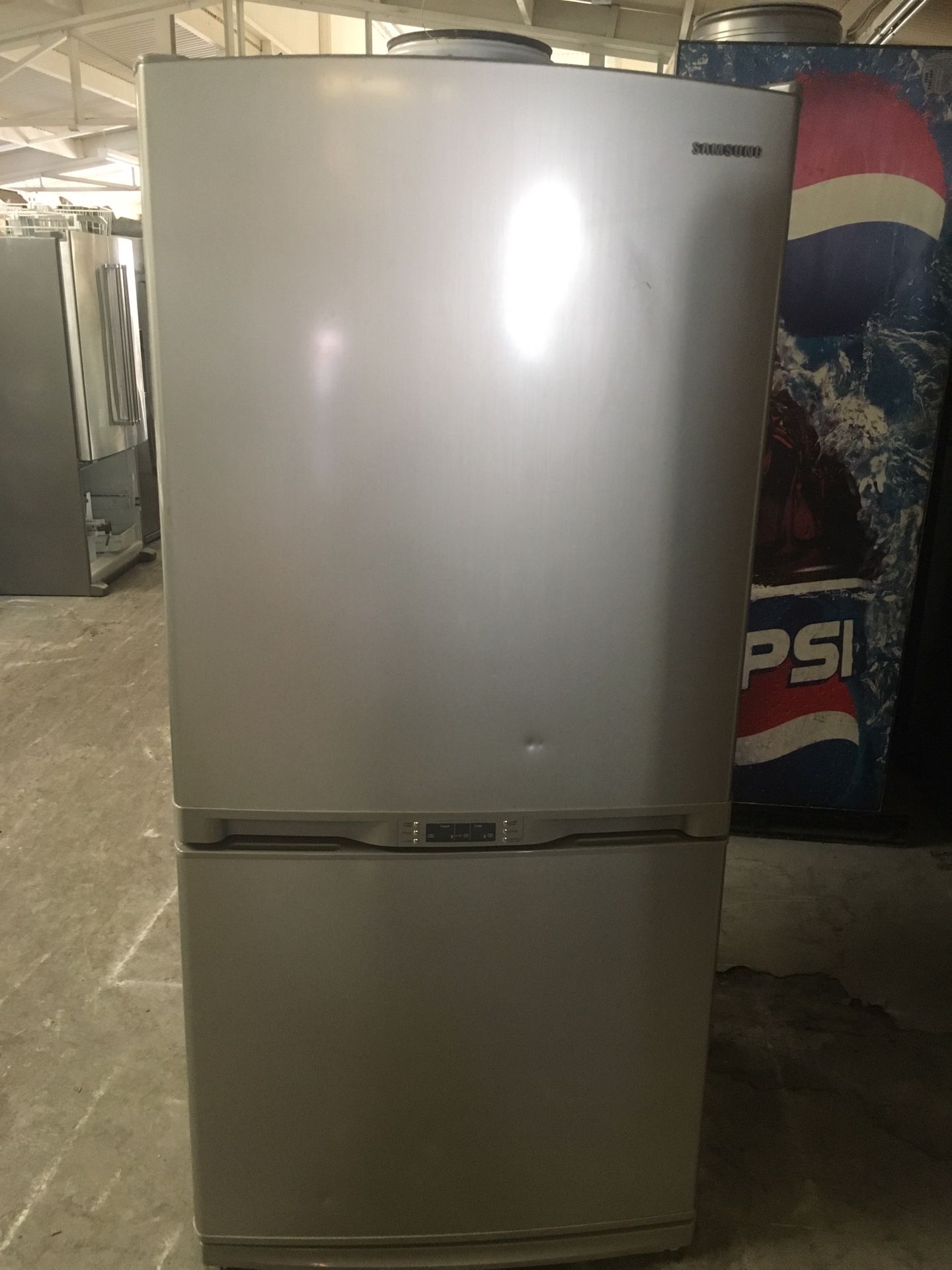 Refrigerator brand Samsung everything is good working condition 90 days warranty delivery and installation