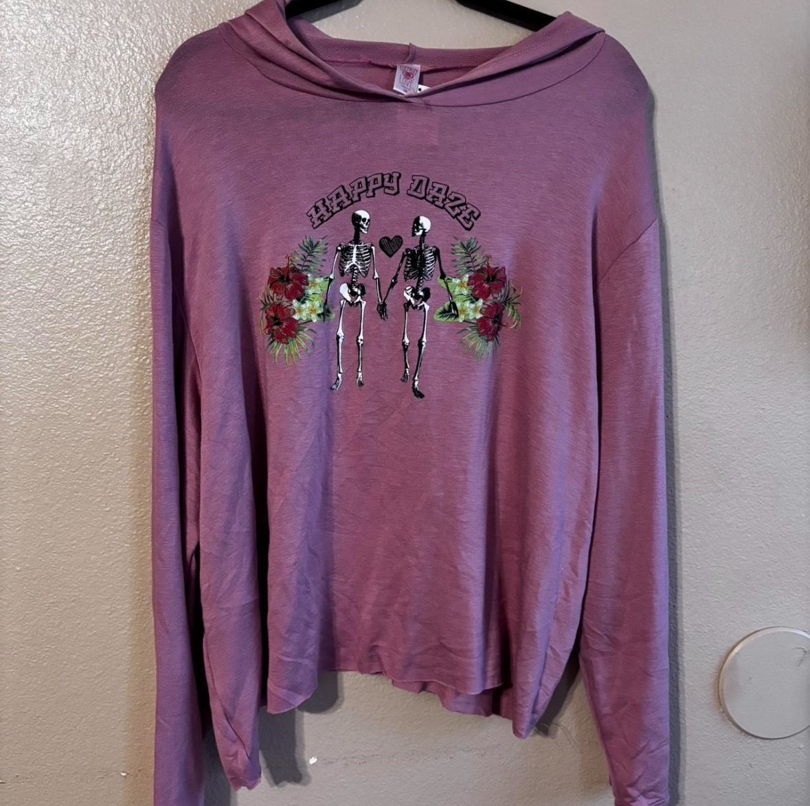 Women’s 2XL pink long sleeve hooded shirt with skeleton design