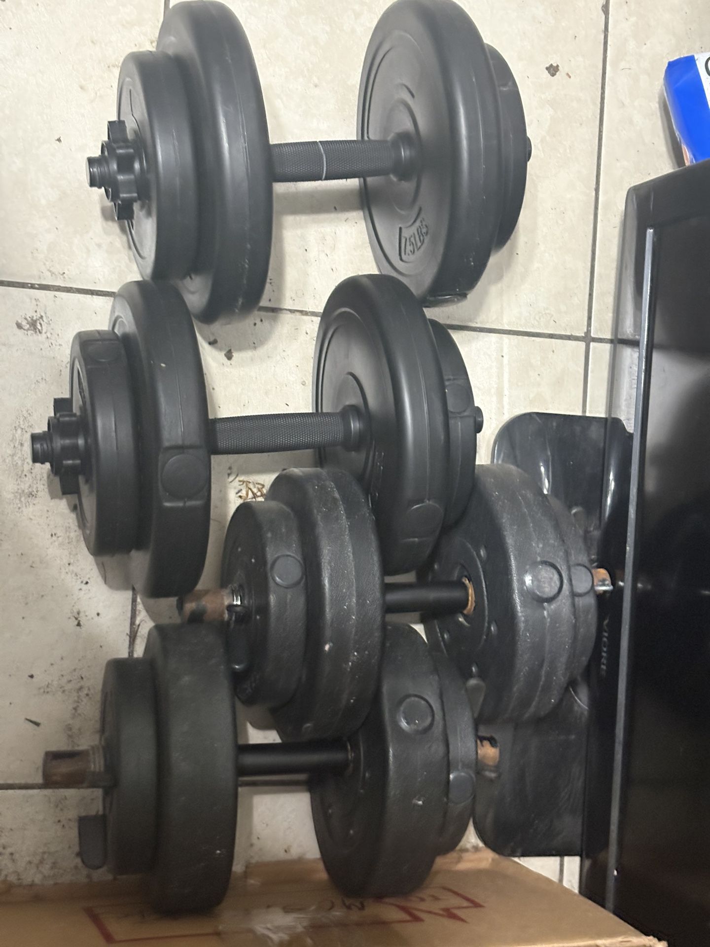 Two Sets Of Dumbbells