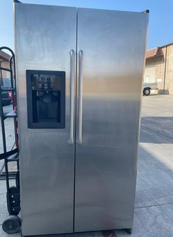 GE  Side-by-Side Stainless Steel Refrigerator
