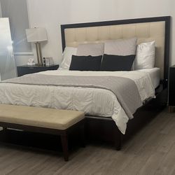 Bed from Bernhardt with a leather headboard wood frame.