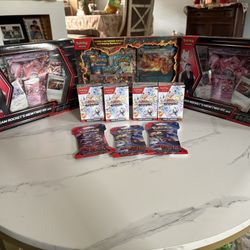 Prismatic Bundles,Charzard pack and DR Singles 