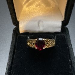 Gold Plated Ring With Ruby Stone..Size 7