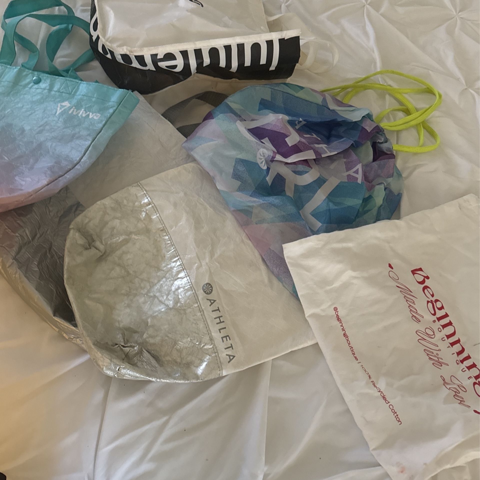 Various Bags —lulu, Athleta, Ivivva, Etc
