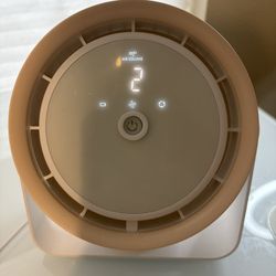 Small USB desk fan in good working condition.