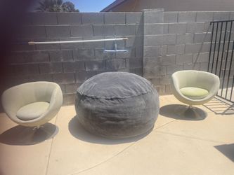 Two Swivel Chairs And Large Lounge Chair