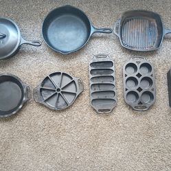 6 piece cast iron lodge brand cast iron set along with 2 additional pieces of cast iron skillets.