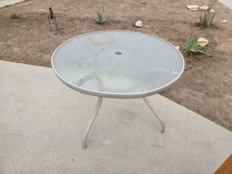 Glass and metal Table