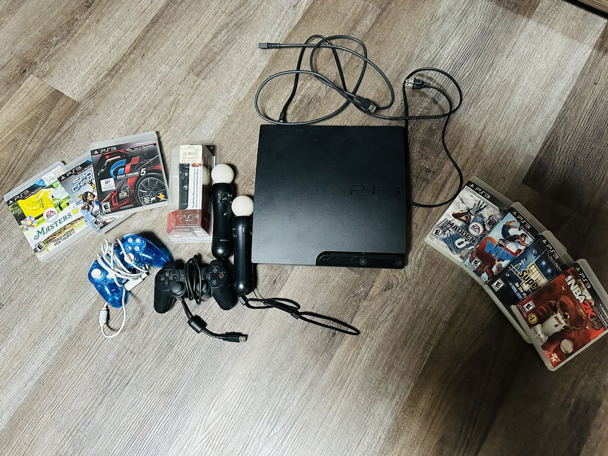 PlayStation 3 with 7 Games & Extra Remotes 