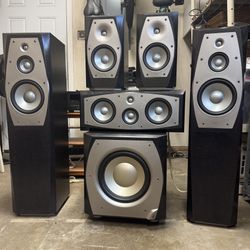 Complete Infinity Interlude surround sound speakers.