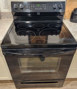 Black Kenmore 30-inch electric glass top stove