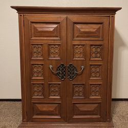 Solid wood dresser in traditional / Old World style.