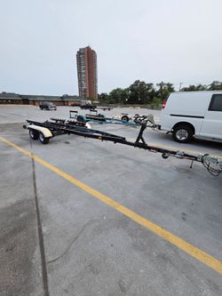 Holesclaw rollerbunk boat trailer. 23' to 26'