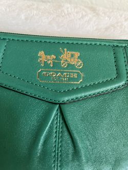 AUTHENTIC LEATHER COACH WRISTLET.