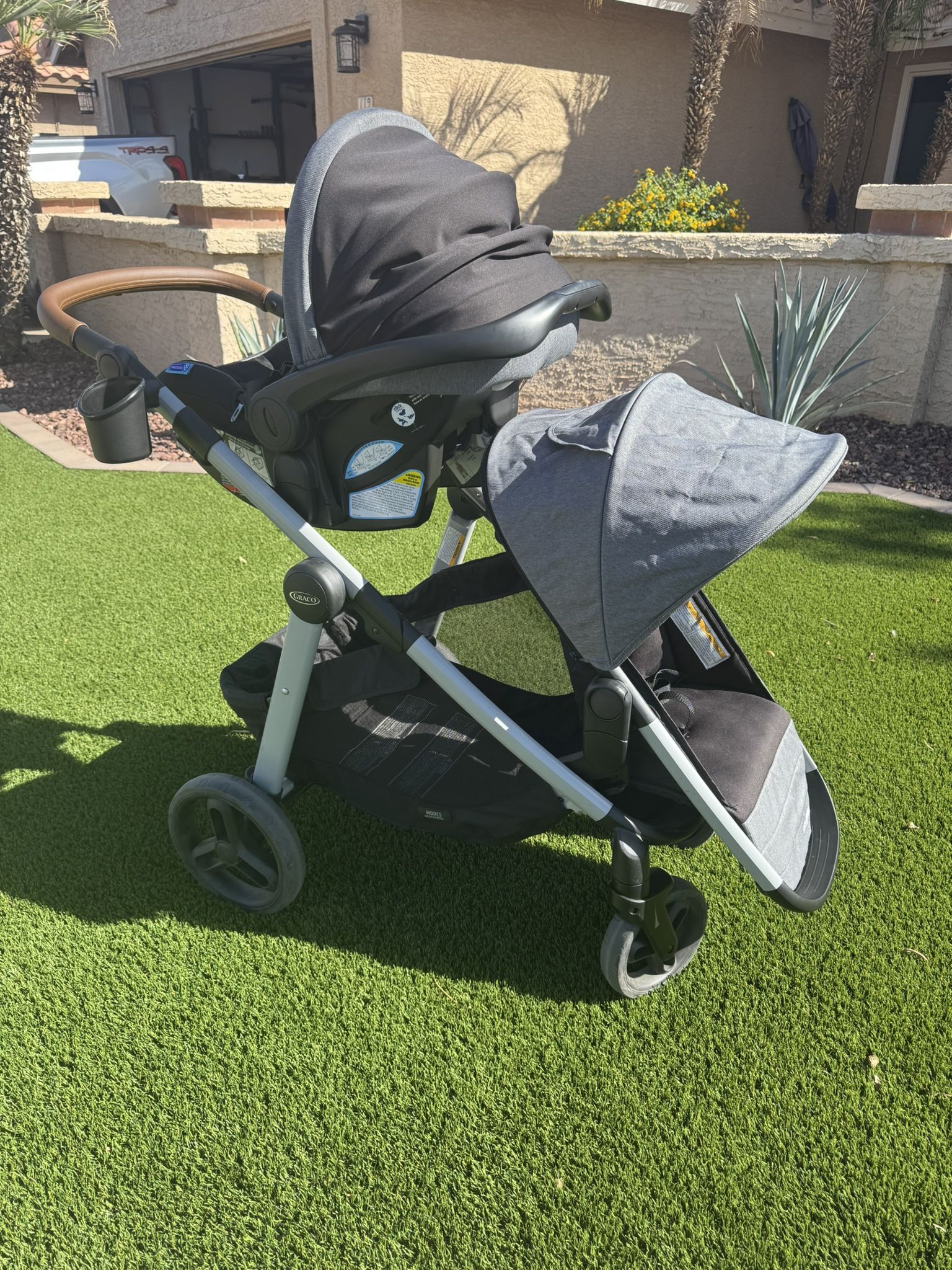 Graco Modes Nest2Grow Travel System, Ren with Expandable Double Stroller + car seat and base