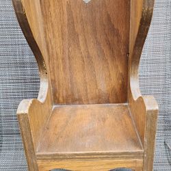 Vintage wooden doll chair with heart cutout