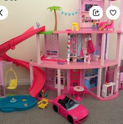 Barbie Dream house with car and jet with box of  Barbie’s