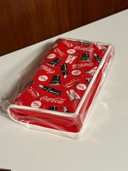 Coca-Cola zip wallet with Coca-Cola logos