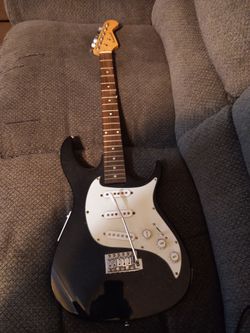 Black Stratocaster-Style Electric Guitar
