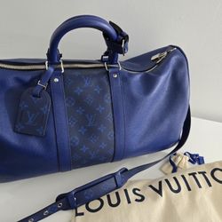 Louis Vuitton Keepall Bandouliere 50 in the navy blue Monogram Taigarama collection 
