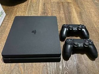 Ps4 slim 1tb with 2 remotes an wires read info