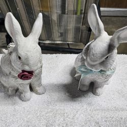 2 white ceramic  rabbit figurines, 