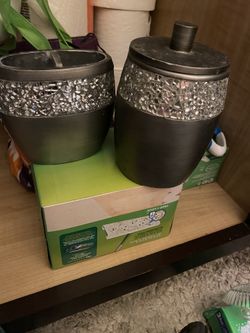 Silver bathroom containers