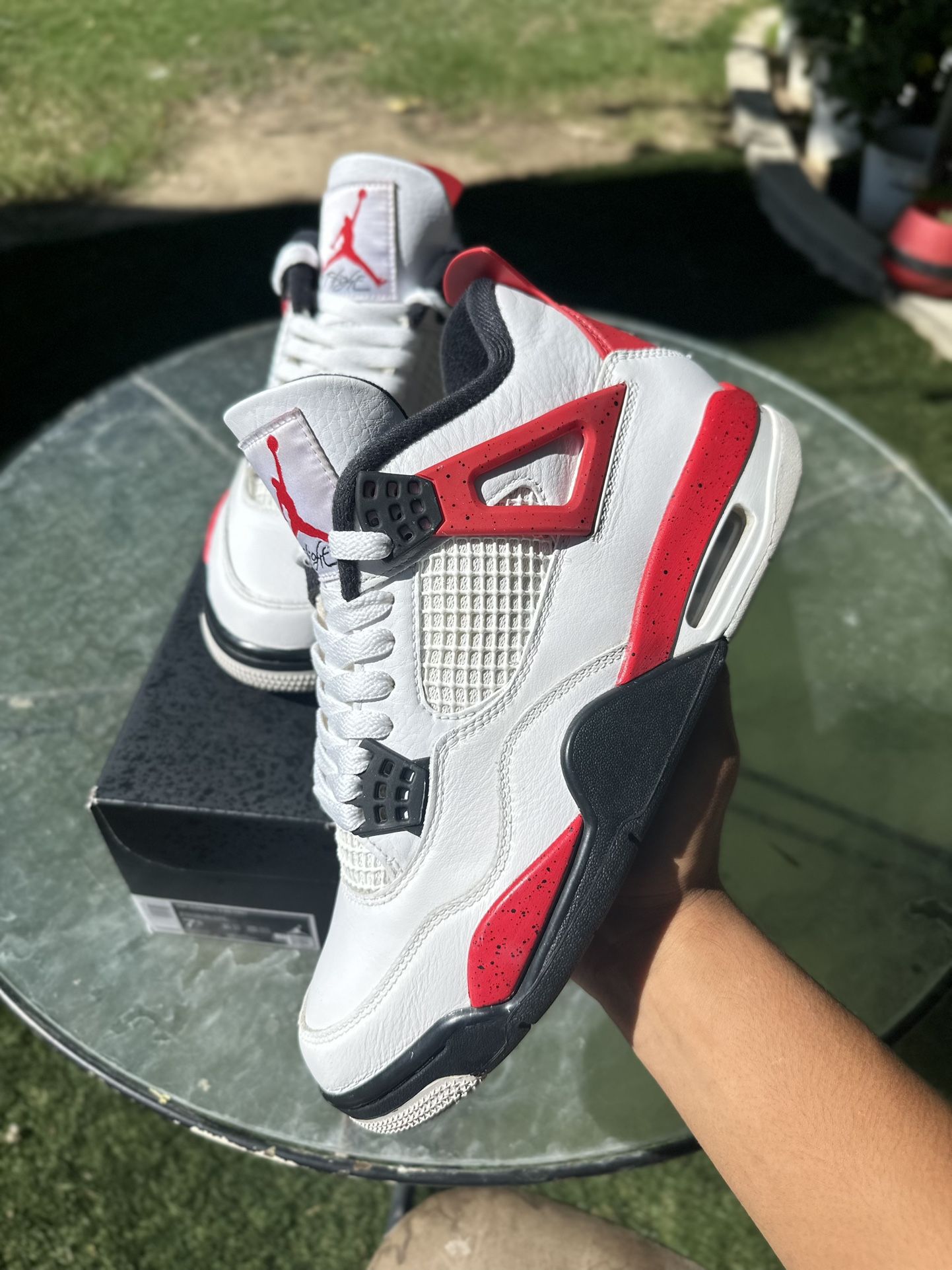 Jordan 4s “Red Cement”