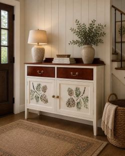 Cabinet hitch entry way storage statement piece pinecone detail