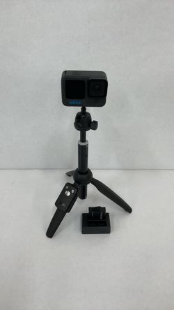 GoPro 12 camera with remote tripod, two batteries and charger