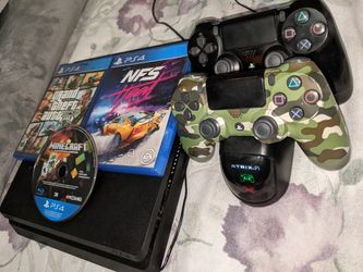 PS4 With 4 Games And 2 Controllers With Cords And Controller Charger
