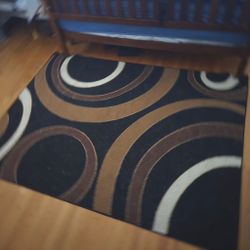 Black Area Rug with Circle Pattern