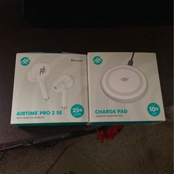 Set Of Airtime Pro 2 Se & charge Pad Née In The Box