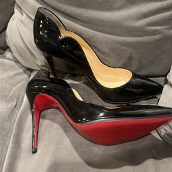 Christian Louboutin (red Bottoms) 
