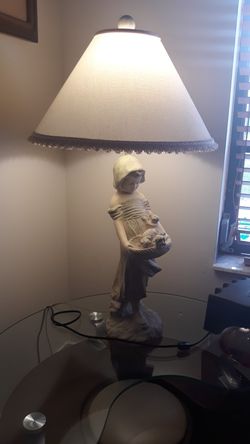 Lamp with ceramic figure