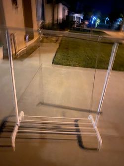 white steel clothing rack