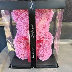 New, pink rose teddy bear made from synthetic foam roses.