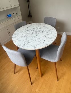 Round dining table with chairs