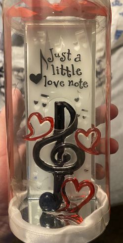 novelty glass music note keepsake with the phrase "Just a little love note". 