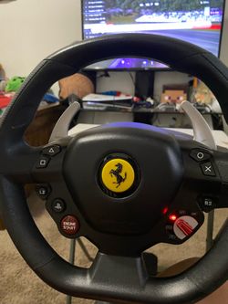 Thrust master Ferrari steering wheel  and pedals included