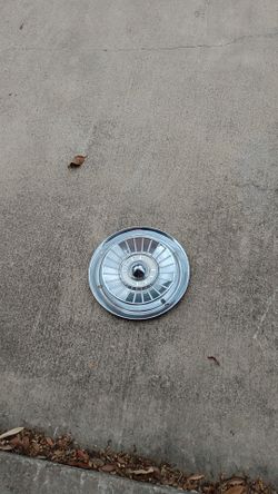 57 Ford hubcaps,4 each