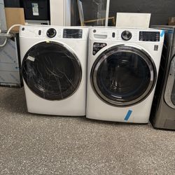 Ge Smart Front Load Washer And Gas Dryer Set In White